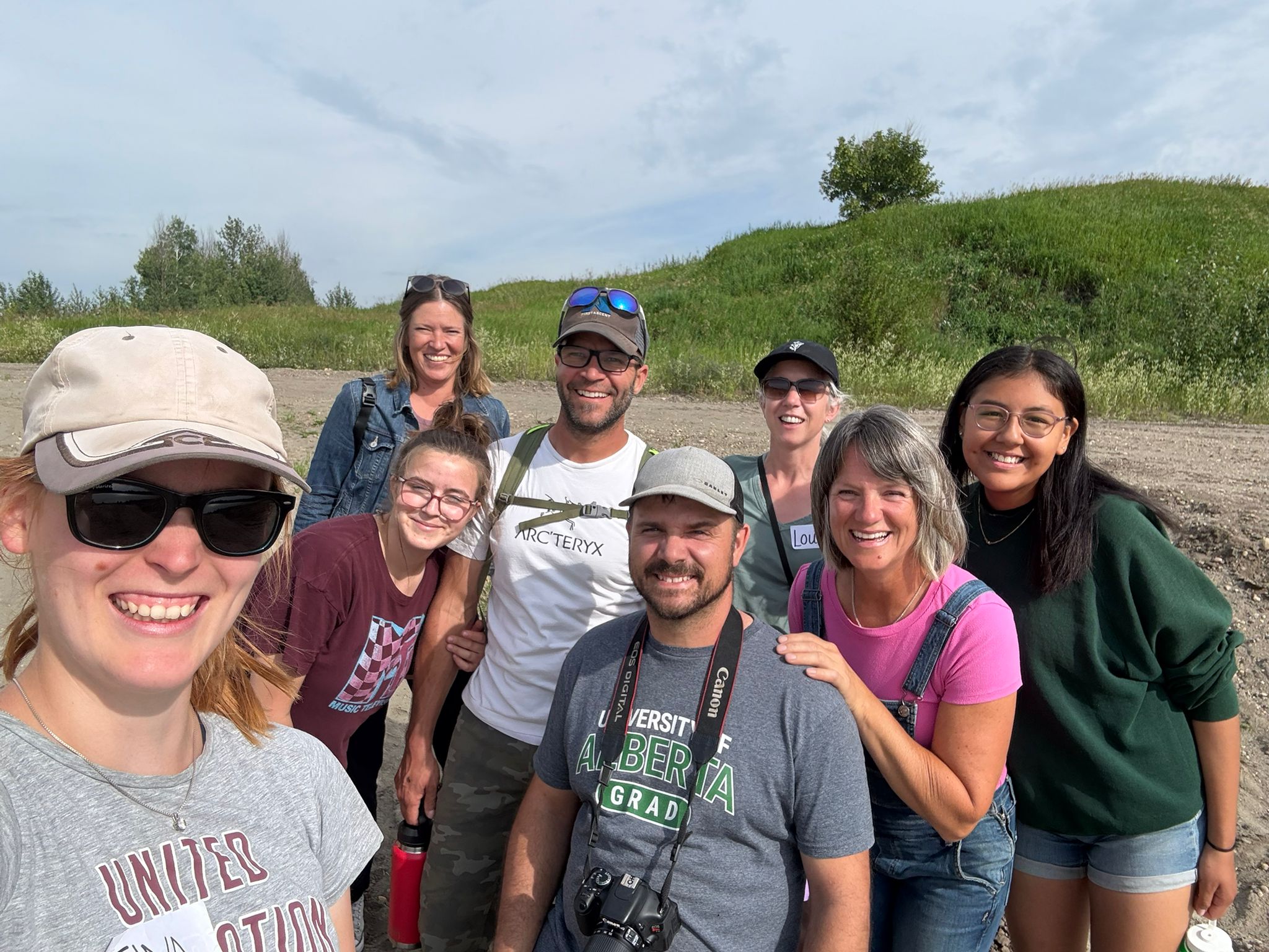 A group of smiling people outdoors