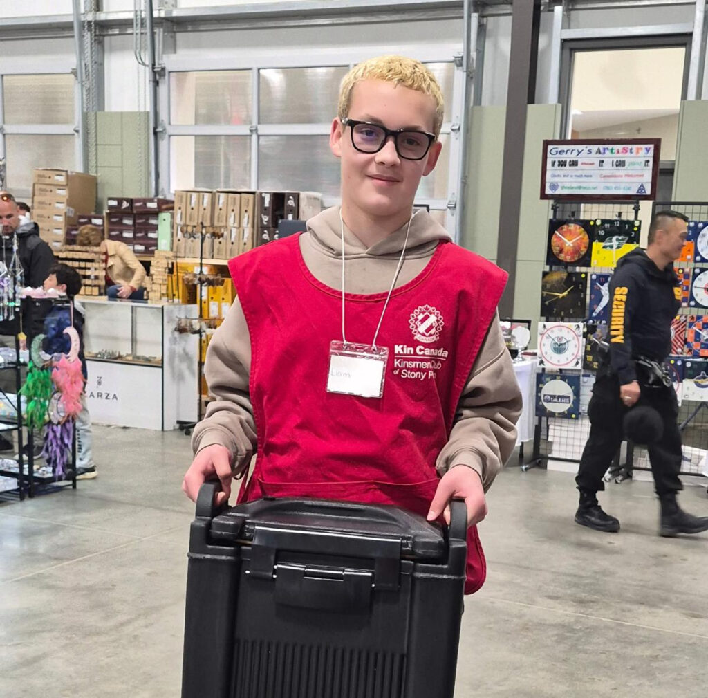 Youth holding box