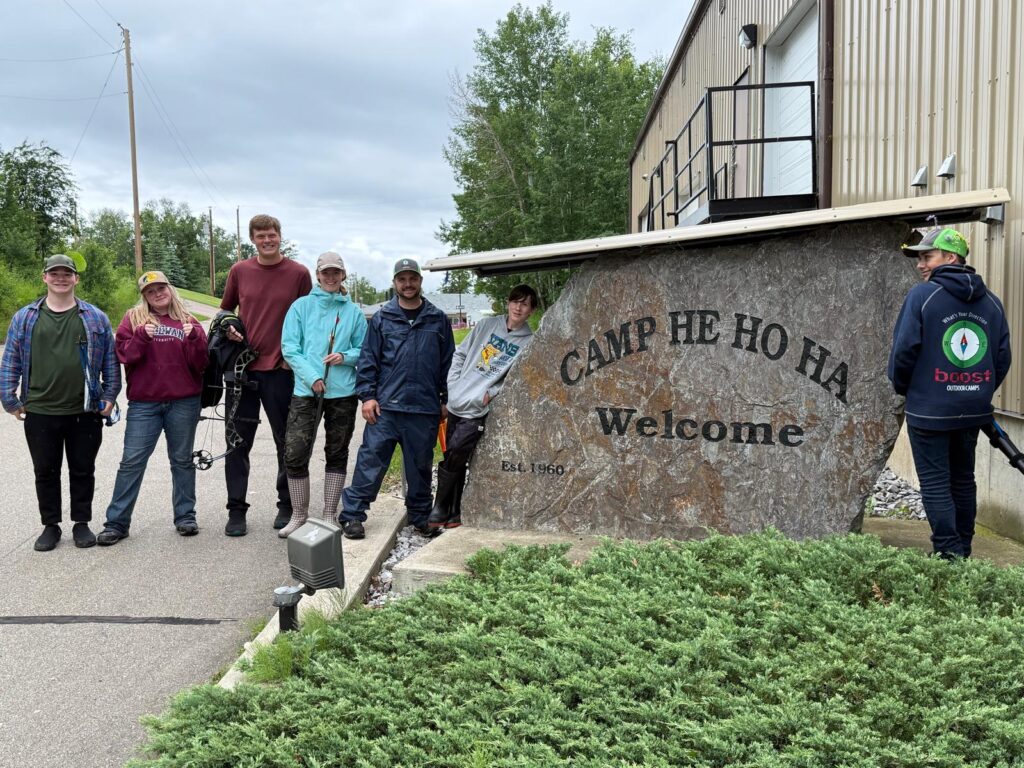 A group of people standing by a 