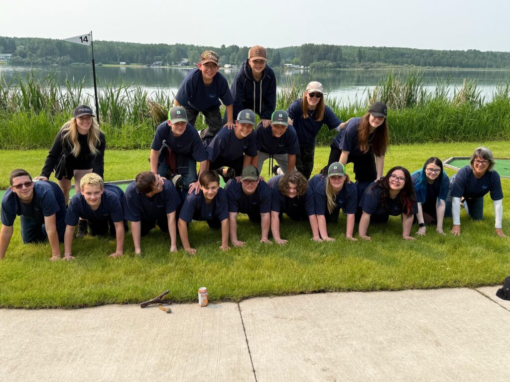 A group of people building a human pyramid